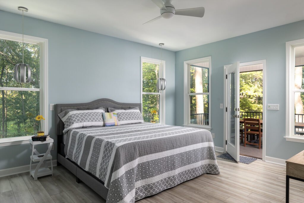 Quiet Cove's minimalist bedroom design, providing a distraction-free environment for deep work and restoration.