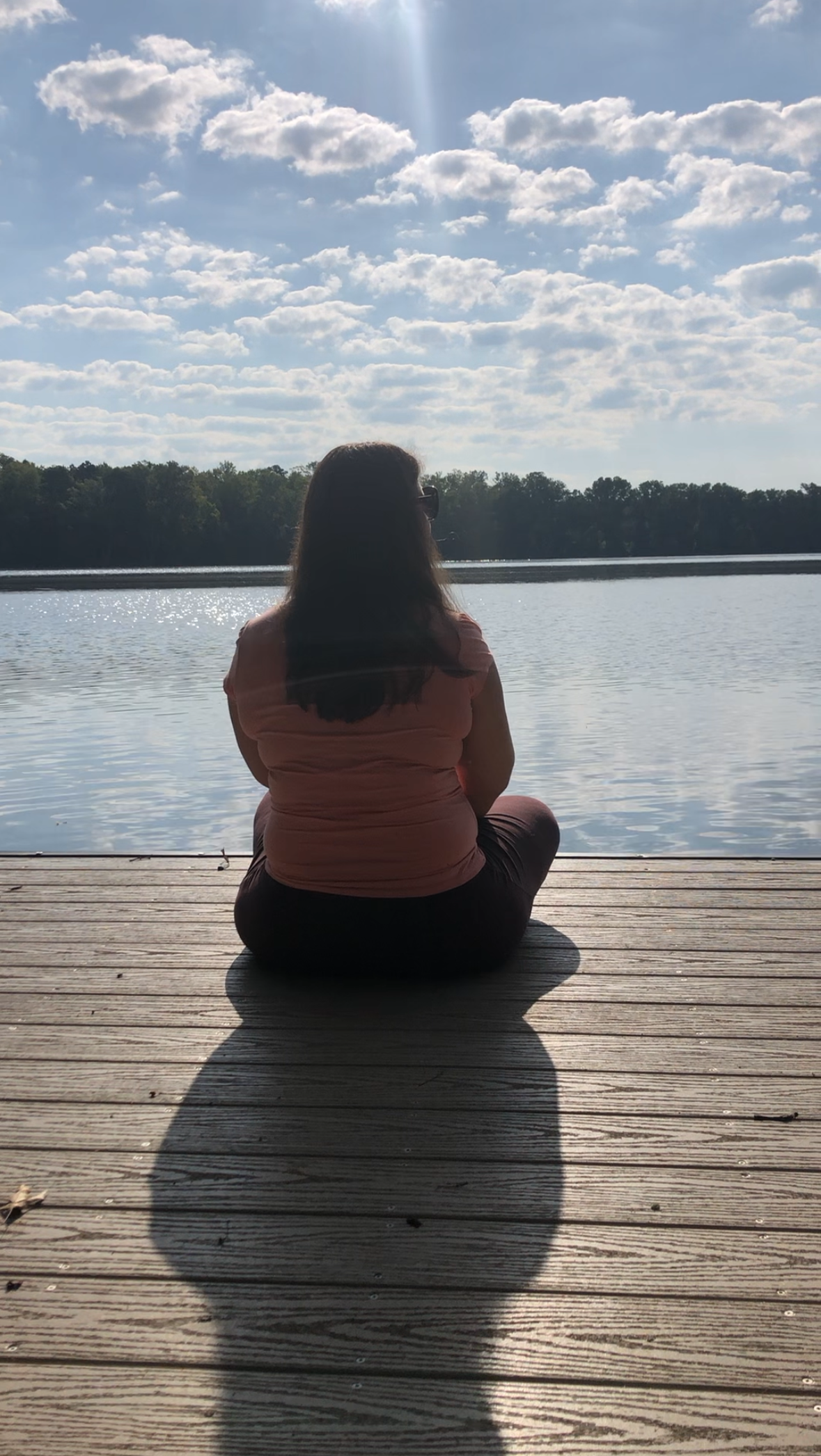 Serene lakefront seating area at Quiet Cove, designed as an executive burnout recovery retreat for high-achieving leaders.